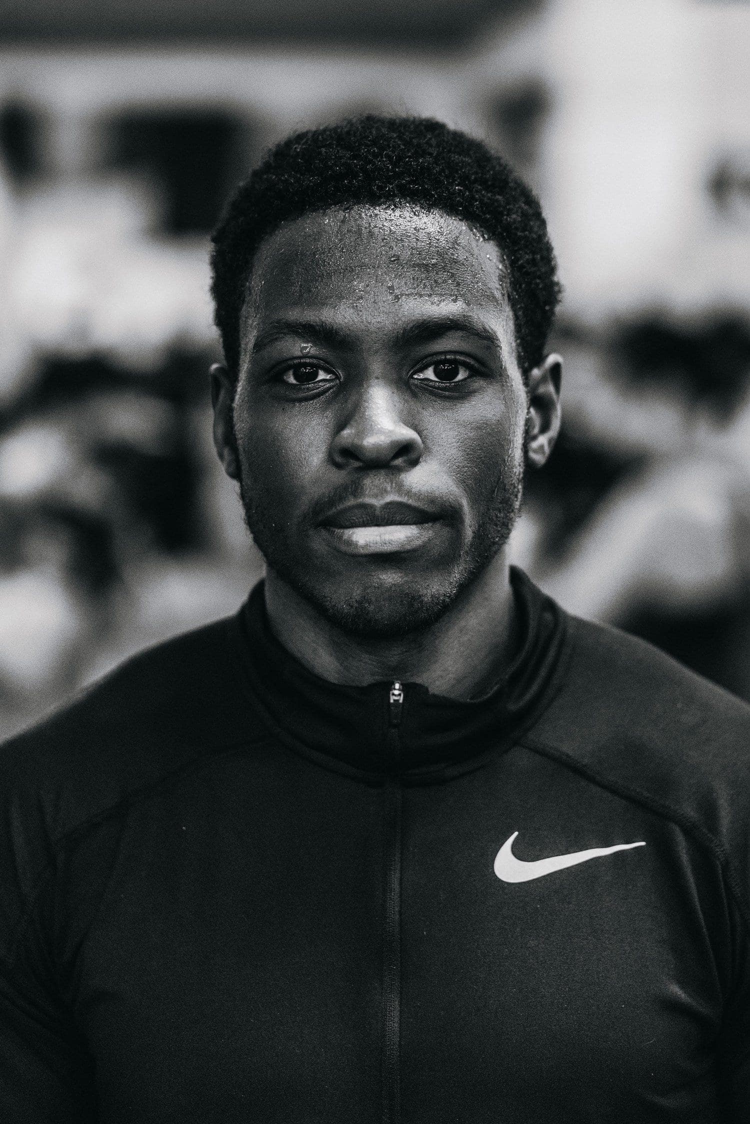 A fighter looking into the lens after training